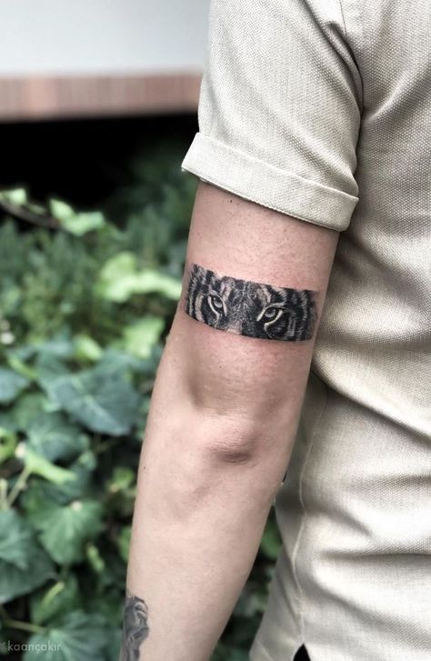 Tattoo Ideas 2023 Men, Men Tricep Tattoo, Tricep Tattoo Men Ideas, Small Tiger Tattoo Men, Tiger Tattoo For Men, Tiger Tattoo Inner Bicep, Tiger Tattoo Design Men, Eye Of The Tiger Tattoo, Arm Tattoos Tiger