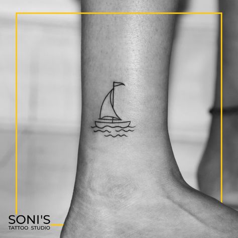 Boat Tattoo Tattoo on ankle . Soni's Tattoo Studio 09974432274 Navsari Gujarat . Tattoo done by your favourite artist @nitesh_devi_soni at @sonistattoo . #sonistattoo #navsari #gujarat #india #tattoo #besttattooingujarat #besttattooinindia #tattooingujarat #tattooinindia #tattoos #tattooartist #tattooideas #tattooist #tattoolife #tattoodesign #tattoolove #tattoowork #art #tattoostudio #tattooart #tattoopro #proffesionaltattooartist #customtattoo #uniquetattoo Sailboat Tattoo Design, Life Boat Tattoo, Small Sail Boat Tattoo Simple, Boat Outline Tattoo, Sale Boat Tattoo, Minimal Boat Tattoo, Cute Boat Tattoo, Minimal Ship Tattoo, Tiny Ship Tattoo