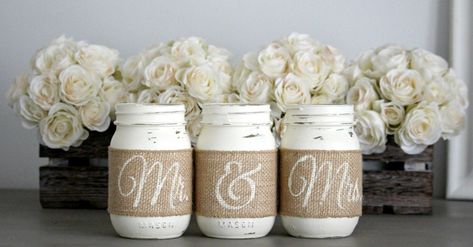 "Set of 3 decorative Mason Jars in Old White . Each jar is hand painted & distressed, decorated with natural burlap with words Mr. & Mrs. Perfect for weddings decor, engagement party or bridal shower. SIZE: REGULAR MOUTH PINT ( APPROX. 5\" TALL, 2.5\" OPENING) If you would like to add Gift Box & Congratulation Card Upgrade please click here: https://www.etsy.com/listing/269883856/rustic-bridal-shower-giftengagement-gift?ref=listing-shop-header-0 This listing is for set of 3 jars ONLY Engagement Party Table Centerpieces, Wedding Table Decor Rustic, Country Wedding Colors, Engagement Party Table, Cheap Wedding Table Centerpieces, Wedding Accessories Diy, Table Decor Rustic, Rustic Wedding Table Decor, How To Dress For A Wedding