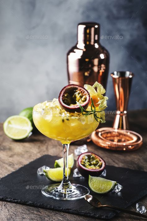 Passion fruit Alcoholic cocktail with gin, juice, rosemary and ice by 5PH. Passion fruit Alcoholic cocktail with gin, juice, rosemary and ice. Gray background, copper bar tools, copy space #Sponsored #juice, #gin, #ice, #rosemary Cocktail Pictures Photography, Cocktail Photoshoot, Cocktail With Gin, Food Photography Fruit, Holiday Party Drinks, Cocktail Pictures, Cocktail Martini, Work Photography, Cocktail Shots