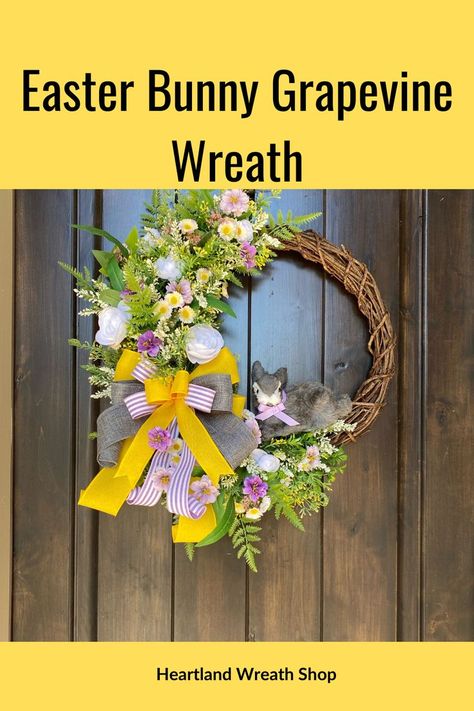 Large Easter floral grapevine wreath with purple, yellow and lavender spring wildflowers. there is a fuzzy little gray foam bunny sitting on the bottom edge by the flowers keeping watch from your front door.
Yellow and lavender wired ribbon bow with long tails. Bunny Grapevine Wreath, Front Door Purple, Front Door Yellow, Easter Floral Wreath, Yellow And Lavender, Gray Bunny, Floral Grapevine, Grey Bunny, Spring Wildflowers