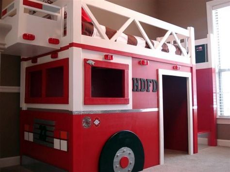 DIY a Fire Station loft bed, inspired by Pottery Barn Kids Firehouse Loft Bed. This bed features solid wood construction, clever use of materials, and easy panel design for moving and storing. Features ladder that can be placed on either side, an open back and wide entryway. Create extra room in your child's room on the tightest of budgets by making your own Fire Dept Loft Bed! Fire Truck Bed, Fire Truck Bedroom, Fire Truck Room, Playhouse Loft Bed, Firetruck Bed, Truck Bedroom, Diy Toddler Bed, Truck Room, Diy Bunk Bed