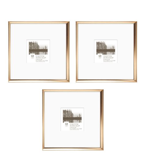 The 12" x 12" Gold Metal Gallery Frame Set by Place & Time offers a trio of gleaming frames that promise to uplift the ambiance of any space Each frame in this set is constructed from premium aluminum and adorned with a luminous gold finish, delivering both strength and elegance Designed to hold a 5x5 inch photograph, the included mat creates a polished, bordered look that highlights the beauty of the displayed image With a 1213x1213 inch dimension and a 098 - inch thickness, these frames are ve 15 Picture Gallery Wall, Large Matted Picture Frames, Gold Frame Gallery Wall, Frames For Pictures, Bathroom Gallery Wall, Gallery Frame Set, Barn House Interior, 8x8 Frame, Picture Gallery Wall