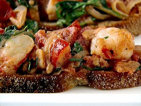 Bruschetta with Shrimp, Tarragon and Arugula Recipe | Giada De Laurentiis | Food Network Shrimp Bruschetta, Giada De Laurentiis Recipes, Arugula Recipes, Bruschetta Recipe, Giada De Laurentiis, Fine Food, Yummy Appetizers, Arugula, Dinner Parties