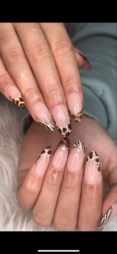 french tips, brown french tips, animal print nails, cheetah nails, zebra mails, giraffe nails, tiger nails, zoo print nails, fall nails, y2k nails, trendy nails, brown french tips, zebra french tips, multicolor french tips, ombre french tips, gelx nails, nude nails, hailey bieber nails, trending nails, detailed nails, nail art, nail inspo, almond nails Giraffe French Tip Nails, Zoo Nails Animals, French Tiger Nails, Animal Print Nails French Tip, Brown Zebra Print Nails, Tiger French Tip Nails, Ombre Leopard Nails, Brown Animal Print Nails, Leo Nail Ideas