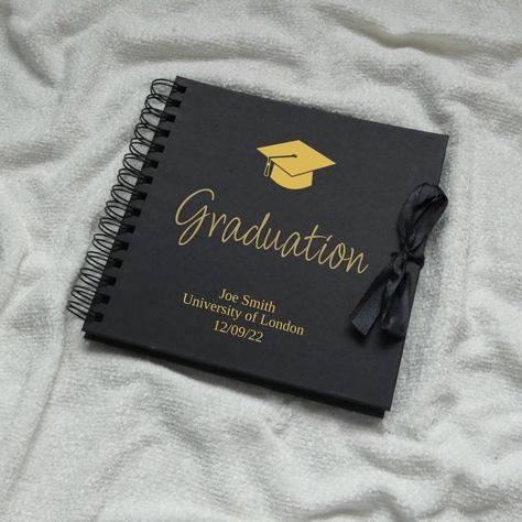 This personalised graduation scrapbook is the perfect gift to commemorate the special day of a graduate. This memory book features an elegant and detailed graduation hat illustration, along with the graduate's name, university and date of graduation. It's a one-of-a-kind keepsake that will be treasured for years to come. This custom scrapbook is designed to hold all of the special moments and memories of the graduate's achievement. From photographs of the graduation ceremony, to candid shots wit Graduation Memory Book, Graduation Album, Memory Book School, School Keepsake, Graduation Memories, Graduation Book, Graduation Keepsake, Hat Illustration, Graduation Scrapbook