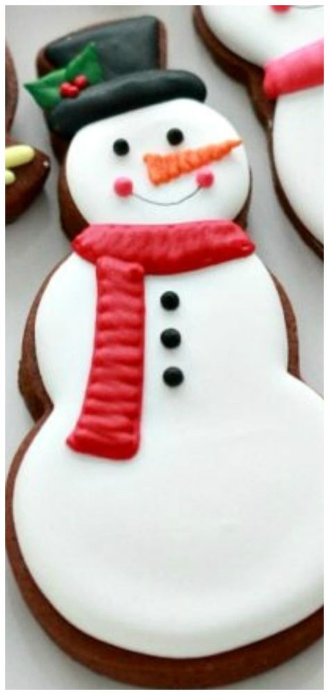 Nostalgic charm with retro elements. Gingerbread Snowman Decoration, Sugar Cookies Gingerbread Man, Snowman Cutout Cookies, Gingerbread Cookies Snowman, Gingerbread Snowman Cookies, Snowman Gingerbread Cookies, Christmas Mitten Cookies Decorated, Decorated Cut Out Cookies, Christmas Cookies Decorated Snowman