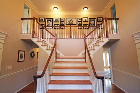 A Colonial Estate in Glendale with a Fancy Hollywood-Style Split Staircase - Cincinnati Magazine Split Staircase, Colonial Estate, Galley Style Kitchen, Entry Stairs, Brick Backsplash, Hollywood Style, Countryside House, Modern Barn, Grand Staircase