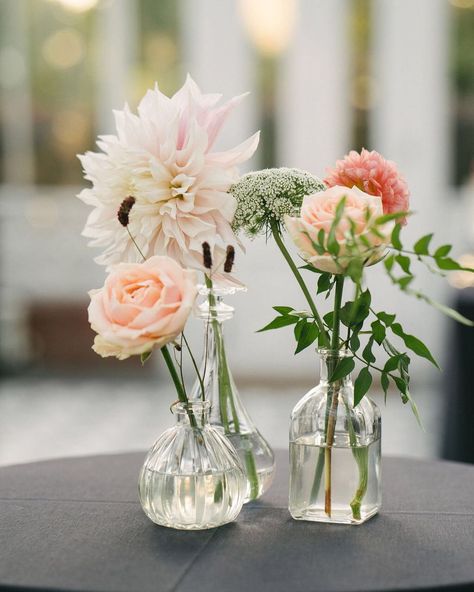 Poseur Table Flowers, Dahlia Flower Wedding Centerpieces, Bud Vase Trio Centerpiece, Dahlias In Bud Vases, Mixed Vases Centerpiece, Dahlia Wedding Table Decor, Dahlia Bud Vases, Dahlia Bud Vase, Pink Rose Arrangements