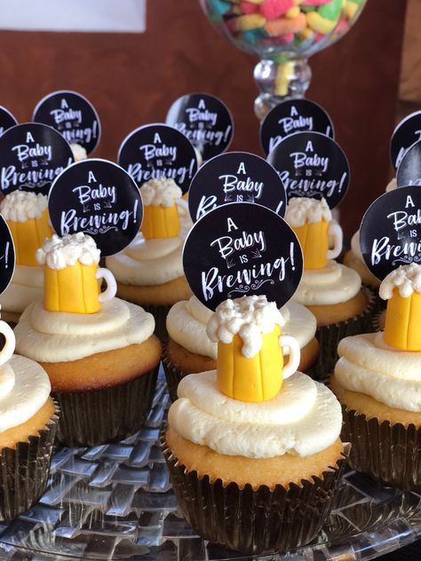 Cupcakes for your beer theme baby shower Beer Cupcakes Decoration, Cupcake Decor For Men, Cheers And Beers Cupcake, Pregger Kegger Food, Beer Themed Gender Reveal, Beer Theme Cupcakes, Beer Themed Party Ideas, Beer Mug Cupcakes, Pizza And Beer Baby Shower Ideas