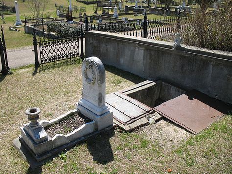 Natchez -  10 yr old Florence died in 1871. She was extremely frightened of storms and her grief-stricken mother had Florence's casket constructed with a glass window at the head. The grave was dug to provide an area, the same depth of the coffin, at the child’s head, but this area had steps that would allow the mother to descend to her daughter’s level so she could comfort her during storms. To shelter the mother, metal trap doors were installed over the area the mother would occupy. Cemetery Headstones, Old Cemeteries, Cemetery Art, After Life, Grave Marker, Six Feet Under, Memento Mori, Tombstone, Graveyard