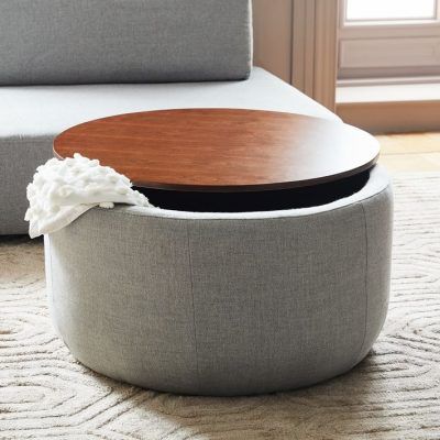 The Most Versatile Pieces of Furniture Worth Investing In #theeverygirl Diy Storage Ottoman, Storage Ottoman Coffee Table, Diy Storage Bench, Round Storage Ottoman, Oversized Furniture, Large Ottoman, Upholstered Storage Bench, Round Storage, Round Ottoman