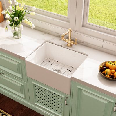 Farmhouse sink is regarded as a timeless classic. This sink is made of premium natural fireclay and handcrafted by experienced workers. Fired at 2300°F to ensure durability and insulation, and then evenly glazed on the surface several times, giving the sink a smooth surface and resistance to stains and scratches, making it easy to clean and able to stay snow for a long time. Unlike other hollow sinks, this is a solid apron sink with narrower and stiffer sides. 9" bowl depth provides sufficient s Small Apron Sink, Farmhouse Sinks, Fairycore House, Kohler Farmer Sink, White Porcelain Farmhouse Sink, Ceramic Apron Sink, Blanco Sinks, Bathroom Sink Bowls, Small Farmhouse Kitchen