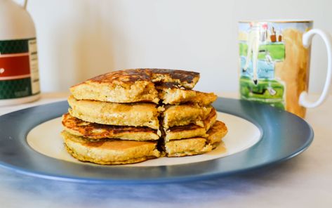 These acorn squash pancakes are a healthy and delicious fall breakfast. Roasted acorn squash puree adds depth of flavor to fluffy whole grain pancakes. Acorn Squash Puree, Two Pancake Recipe, Squash Pancakes, Oatmeal And Eggs, Whole Grain Pancakes, Drinks From Around The World, Roasted Acorn Squash, Running Coach, Squash Puree