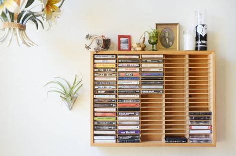 Watch This TikToker Transform an Old Cassette Holder Into a Charming Advent Calendar | Apartment Therapy Cassette Shelf, Cassette Holder, Small Room Hacks, Thrifting Diy, Old Cassette, Studio In Casa, Cassette Storage, Cozy Bohemian, Music Storage