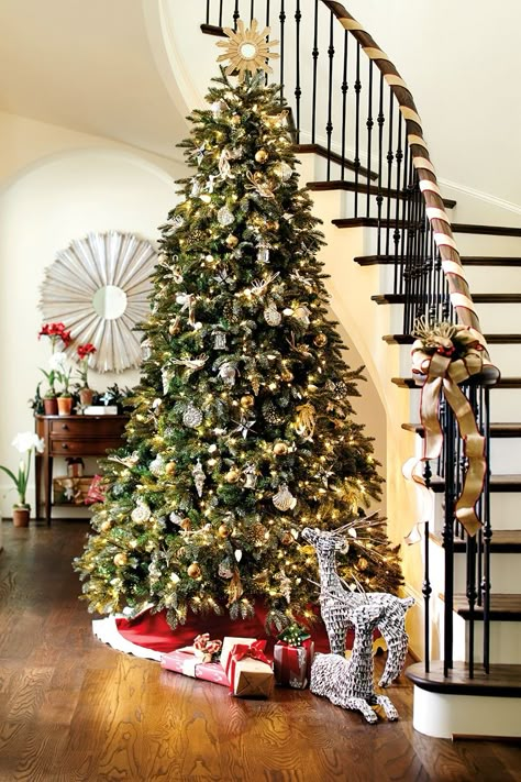 Wrap your staircase banister in ribbon rather than live garland -- it's easier on pets and on your bank account. Christmas Banister, Christmas Stairs Decorations, Christmas In America, Staircase Decor Ideas, Christmas Palette, Christmas Stairs, Christmas Staircase, Holiday Mantel, Christmas Party Themes