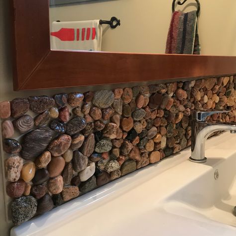 Rock Backsplash Bathroom, River Themed Bathroom, Diy Stone Wall Interior, Summer Wood Projects, Stone Backsplash Bathroom, Rock Wall Interior, River Rock Backsplash, Diy Stone Wall, River Rock Shower