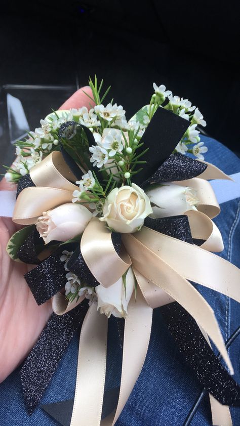 Hoco Corsage For Black Dress, Prom Corsage With Black Dress, Corsage And Boutonniere Black Dress, Corsage For Black Dress, Champagne Colored Prom Dresses, Prom Flowers Corsage For Black Dress, Corsage Prom Black And Silver, Black Ball Dress, Prom 2k23