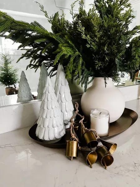 Holiday decor is 25% off from McGee! Ceramic trees, greenery, candle, brass bells, tray, Christmas Christmas Vignette, Christmas Tray, Neutral Christmas Decor, Neutral Christmas, Modern Christmas Decor, Christmas Bathroom, Simple Christmas Decor, Metal Tray, Christmas Greenery