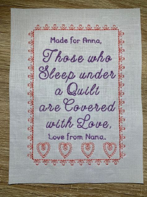 "A custom machine embroidered personalised quilt label is the perfect finishing touch to all your hard work. Your custom label will be a bespoke handmade quilt label made to complement your quilt. Message me for any help designing your thoughtful label which will honour your quilt for many years. This listing is for cute pink and purple quilt label. 4.5 inches wide by 6.5 inches high or 11.5 cm wide by 16.5 cm high.  Add your personalisation: In the personalisation box please enter the customisa Quilt Poems Quotes, Quilt Labels Ideas Sayings, Hand Embroidered Quilt Labels, Memory Quilt Labels Sayings, Quilt Label With Cricut, Hand Made Labels For Quilts, Personalized Quilt Labels, Custom Quilt Labels, Embroidered Quilt Labels