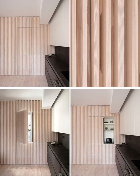 Interior Design Ideas - The wood slat wall in this modern apartment incorporates secret doors, and all storage and service requirements for the apartment, including kitchen appliances and hanging cupboards, resulting in a highly efficient plan. #InteriorDesignIdeas #WoodSlatWall #HiddenAppliances #HiddenFridge #IntegratedFridge #HiddenStorage #SecretDoors #HiddenDoors Kitchen Wood Paneling, Concealed Doors In Wall, Concealed Doors, Secret Doors, Batten Wall, Wood Slat Wall, Integrated Fridge, Apartment Renovation, Hidden Door