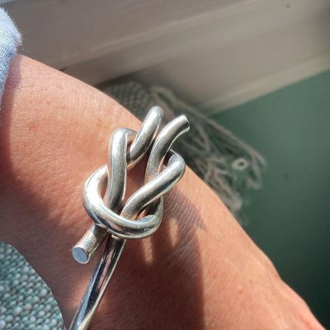 Diane Richardson on Instagram: "SOLD. So many vibes exuding from this incredible vintage Hans Hansen knot bracelet ♥️🪢♥️ It’s fabulous (reef) knot design, iconic Danish craftsmanship coupled with a generous weight of 58 grams, makes this incredibly chic sterling silver bangle simply stunning. Hans Hansen (1884-1940) was a Danish goldsmith who opened a firm in Denmark and quickly became successful producing silver flatware in the early 1900’s. He grew his skill and business to expand into the j Reef Knot, Hans Hansen, Knot Design, Sterling Silver Bangle, Silver Flatware, Knot Bracelet, Sterling Silver Bangles, Silver Bangle, Silver Bangles