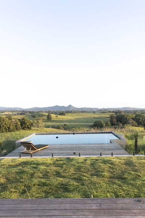 Walker Farm, a gorgeous luxury country home located in Myocum within the hinterland of Byron Bay. Design detailing and Interiors by @thedesignory Building by @sanctuary28gc Architecture by @marc.and.co Photography @the_cat_astrophe #interiordesign #byronbayhome #luxuryhome #interiors #thedesignory Country Pool Landscaping, Country Pool, Pool Balcony, Pool Architecture, Piscina Interior, Summer Cabin, Pool Landscape Design, Natural Swimming Pool, Design Outdoor