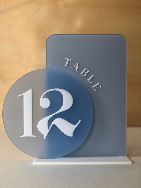 A whimsical and light beachy themed event. Table numbers in custom acrylic. Round Table Numbers, Acrylic Table Signs, Wedding Table Number Ideas, Acrylic Table Numbers Wedding, Layered Table, Table Number Stand, Table Number Ideas, Table Numbers Acrylic, Table Signage