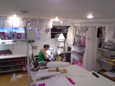 a lovely work room for custom dresses Alterations Shop Interior, Seamstress Studio, Alteration Shop, Big Modern Houses, Sewing Room Inspiration, Wedding Dress Alterations, Treadle Sewing Machines, Dress Alterations, Desk Ideas