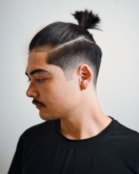 Man Bun Hairstyles Undercut, Low Man Bun, Top Knot Undercut, Man Bun Curly Hair, Man Bun Top Knot, Edgy Undercut, Curly Top Knot, Undercut With Beard, Braids And Twists