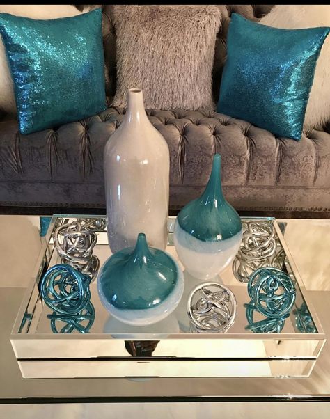 Teal accents on coffee table Teal Living Room Decor, Silver Living Room, Living Room Turquoise, Teal Living Rooms, Teal Decor, Apartment Decorating Living, Glam Living Room, Decor Home Living Room, Living Room Colors