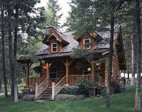 This charming, 760 square-foot log cabin belongs to famous animal expert and zookeeper Jack Hanna. It was named Elk Cabin because it sits on an old elk farm in Montana, just outside Bigfork, but since he shares this secluded retreat with his wife Suzi, they call it their “Honeymoon Suite.” Writer Retreat, Small Log Cabin Plans, River Houses, Alpine Cabin, Log Cabin House, Log Cabin Plans, How To Build A Log Cabin, Log Cabin Living, Little Cabin In The Woods