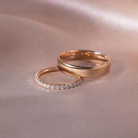 Exquisite Pairs ✨ Wedding band pairs for a couple have a deep-rooted history. The tradition dates back to ancient Egypt, around 3,000 BCE. The Egyptians are known to be the earliest users of rings to symbolize love and commitment. They crafted rings from materials like braided reeds, hemp, or leather, which were later replaced by more durable metals. The circular shape of the ring, with no beginning or end, symbolized infinity, and was traditionally worn on the fourth finger of the left han... Wedding Band And Engagement Ring Pairing, Marriage Rings Couple, Christian Wedding Rings, Wedding Band Couple, Wedding Rings Couple, Christian Wedding Dress, Couple Together, Couple Ring Design, Couples Wedding Bands