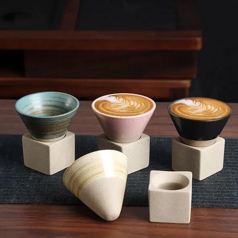 ACT FAST🔥 Retro Rough Pottery Ceramic Coffee Cup - 100ml : $14.99 BUY NOW 💙🛒: thecozycubicle.com/products/retro-rough-pottery-ceramic-coffee-cup-100ml ⭐WHY YOU SHOULD BUY?⭐Introducing the Retro Rough Pottery Ceramic Coffee Cup, a creative and artistic addition to your home decor. This unique cone-shaped teacup features a rough pottery finish with a retro design that adds charm to any setting. The 100ml capacity makes it perfect for serving coffee, lattes, or even as a decorative piece fo... Design Japonais, Cerámica Ideas, Ceramic Tea Cup, Cawan Kopi, Style Japonais, Tableware Collection, Porcelain Cup, Japanese Ceramics, Ceramic Coffee Cups