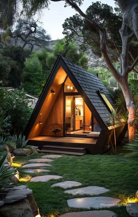 39 Small TRIANGULAR Houses That Just Works (Pictures) #in #Tiny #InteriorInspo #Comfort #and #HouseGoals #Compact #DecorInspiration #Home #Living #Ideas #HomeStyle #Space #Maximizing Camping Houses Ideas, Tiny House Triangle, A Frame Mini House, Small Home Design Ideas Exterior, A Shape Cabin, House With Round Windows, Small A Frame House, Small Airbnb, Glamping House