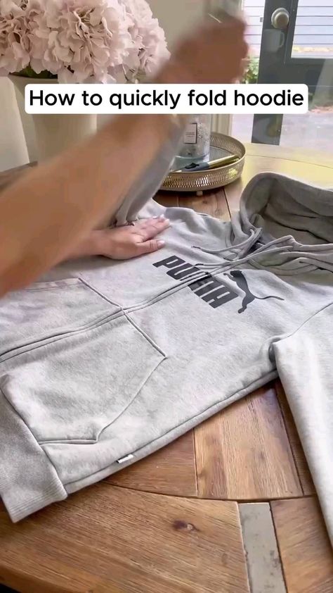 Hack Tips Home | Follow @thefolding2hacks for more content like this! Way to fold hoodie like 📚 #foldingclothes #organize #storagehacks #folding #foldinghacks | Instagram How To Store Hoodies, Shirt Folding Trick, How To Fold Hoodies, Folding Hacks, Shirt Folding, Balanced Living, Clothes Organization Diy, Organization Diy, Folding Clothes