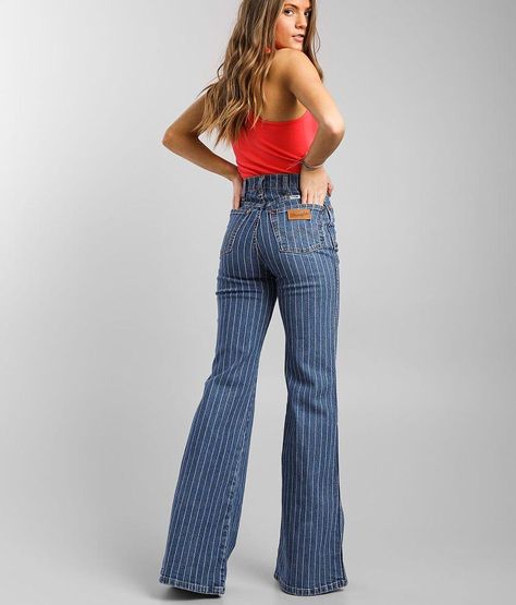 Wrangler® Wanderer High Rise Flare Jean - Blue 32/34, Women's Pinstripe Striped high rise Stretch fabric Slim through the hip and thigh 24 flared bottom opening Shoe sku 960210 Model Info: Height: 5'5 | Bust: 34 | Waist: 24 | Hip: 35 | Wearing Size: 25x34. 99% Cotton, 1% Spandex. Machine wash cold with like colors. Only non-chlorine bleach when needed. Tumble dry low or line dry. Low iron. Do not iron decoration.. WOMEN'S JEAN SIZE CONVERSION CHART Waist (size) 22 23 24 25 26 27 28 29 30 31 32 3 70s Flare Jeans Outfit, Retro Trousers, Flare Jeans Outfit, Vintage Wrangler Jeans, 70s Inspired Fashion, Cute Country Outfits, Western Style Outfits, Western Jeans, Striped Jeans