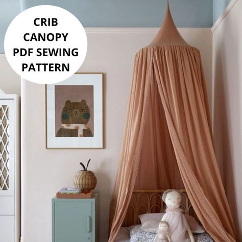 This sewing pattern will help you create a beautiful canopy that adds an enchanting ambiance to your little one's space. Transform a simple crib into a magical haven or create a special play area where your child's imagination can thrive. This PDF file includes instructions and a step-by-step photo tutorial.  The pattern and instructions are in English and in French, easy and detailed.  INSTANT DOWNLOAD *This is a digital file, we are not shipping out a physical item with this purchase* DETAILS: Faux Bed Canopy, Tent Reading Nook, Diy Play Tent, Simple Crib, Cot Canopy, Kids Bed Canopy, Diy Crib, Crib Canopy, Patterned Bedding