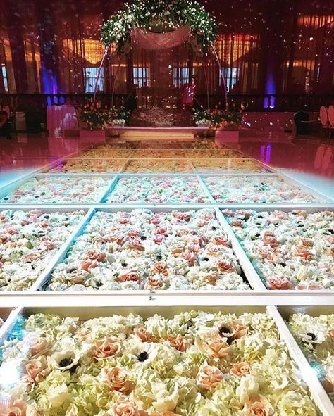 Seriously?! This is stunning! #weddingflowers / #Repost @squarerootdesigns  Tonight's floral dance floor one of our new designs. Planner: @beckerandtheco Venue: @beverlywilshire  Rentals: @palacepartyrental Lighting/Sound: @skylighting_la #squareroot #squarerootdesigns #beverlywilshire #beverlyhills #rodeo #90210 Floral Dance Floor, Wedding Decorations Stage, Elegant Engagement Party, Stage Dance, Fun Wedding Decor, Wedding Reception Backdrop, Dance Floor Wedding, Flower Dance, Dance Floors