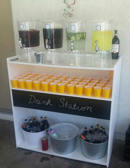 My friend Michael made this drink station for his son's first birthday party.  The chalk board idea gave it the perfect final touch. Drink Display For Party Beverage Stations, Party Cooler Drink Stations, Diy Party Bar Drink Stations, Birthday Bar Ideas Alcohol, Drink Stand For Party, Party Drinks Set Up, Drinking Station Ideas Party, Party Drink Container Ideas, Drink Bar Ideas Party