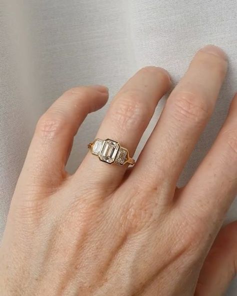 Natalie Marie Jewellery on Instagram: "Inspired by one our most-loved one of a kind designs, the Greta Trio Ring.
⁠
Featuring three emerald cut diamonds, bezel set with a half-round band.⁠
⁠
Let your imagination to take the lead, craft your dream piece with our bespoke team today, link in bio." Trio Engagement Ring, Natalie Marie Jewellery, Engagement Ring Bezel, Half Bezel Setting, Natalie Marie, Half Bezel, Trio Ring, Future Engagement Rings, Ring Bezel