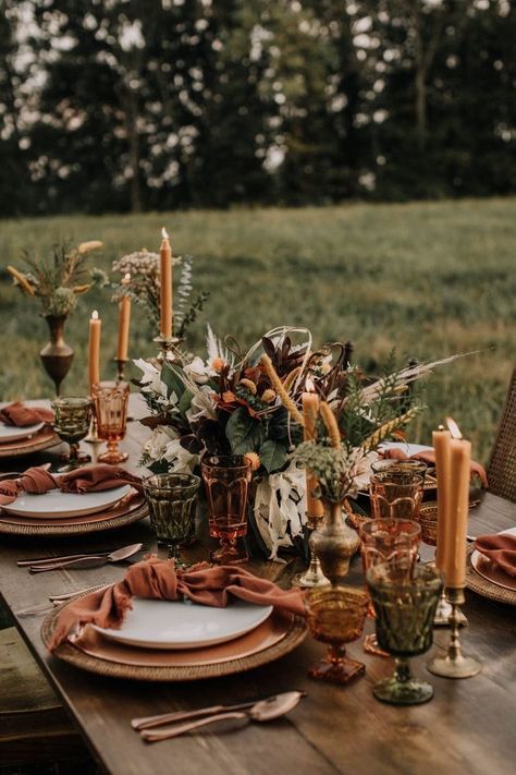 Green Glassware Wedding Table, Green And Rust Wedding Table Decor, Boho Table Design, Vermont Fall Wedding Ideas, Fall Boho Wedding Table Settings, Navy And Rust Table Setting, Romantic Boho Wedding Table Decor, Boho Fall Wedding Reception, Rustic Bohemian Wedding Table Decor