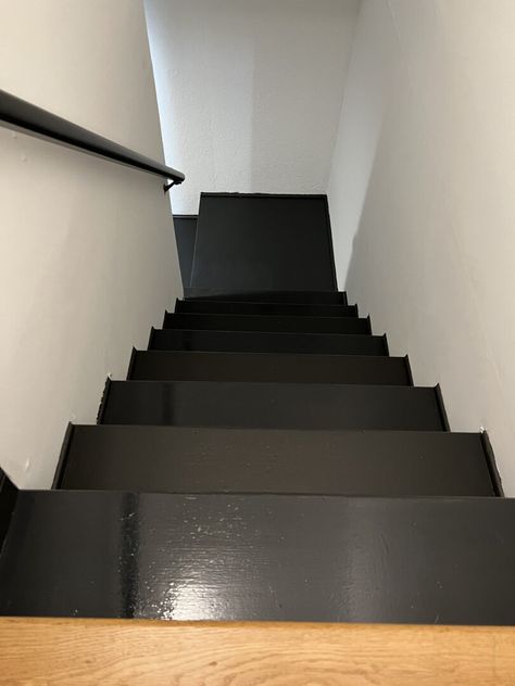 Paint Your Basement Stairs Black for a Modern Look - Building Bluebird Painting Stairs Black, Painted Wood Stairs, Black Painted Stairs, Stairs Black, Painting Stairs, Basement Stairwell, Best White Paint Colors, Basement Steps, Black Staircase