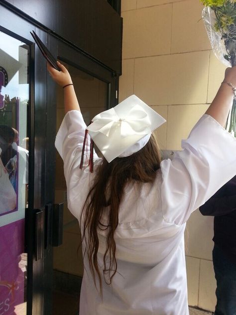 My graduation cap. A big white bow with a rhinestone center. Bow On Graduation Cap, Bow Grad Cap, Graduation Cap With Bow, Bow Graduation Cap, Graduation Cap Bow, Grad Hat, Cap Decoration, Graduation Caps, Graduation Cap Decoration