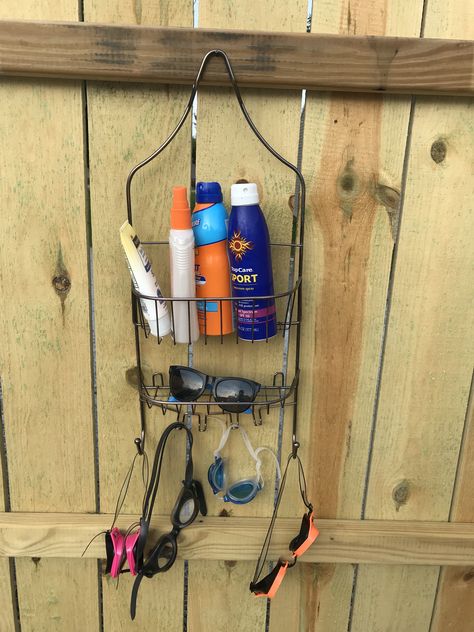 Recycle an old shower caddy to hold goggles and sunscreen Outdoor Shower Caddy, Shower Caddy, Outdoor Shower, Pool Area, Apartment Living, Goggles, Sunscreen, Recycling, Pool