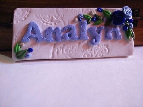 Polymer Clay Name plate with blue flowers Ceramic Name Plate, Clay Name Plate, Ocean Commotion, 7th Grade Art, Name Plates For Home, Air Clay, Name Plate Design, Clay Magnets, Name Plates