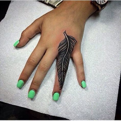 Feather Finger Tattoo 1 Cover Up Finger Tattoos, Side Finger Tattoos, Henne Tattoo, Cute Finger Tattoos, Finger Tattoo For Women, Hand And Finger Tattoos, Ring Finger Tattoos, Finger Tattoo Designs, Feather Tattoo Design