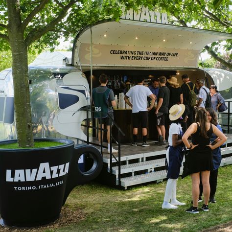 An airstream transformed into a mobile coffee shop that points out the fame of Lavazza from event to event. The Lavazza coffee tasted at the bar of this stunning itinerant station appears even better! A great way to promote a brand enhancing its marketing activities. #lavazza #coffee #coffeetrailer #airstream Airstream Bar Trailers, Portable Coffee Shop, Airstream Coffee Trailer, Airstream Coffee Shop, Coffee Event Ideas, Trailer Coffee Shop, Coffee Food Truck, Food Bike, Mobile Market