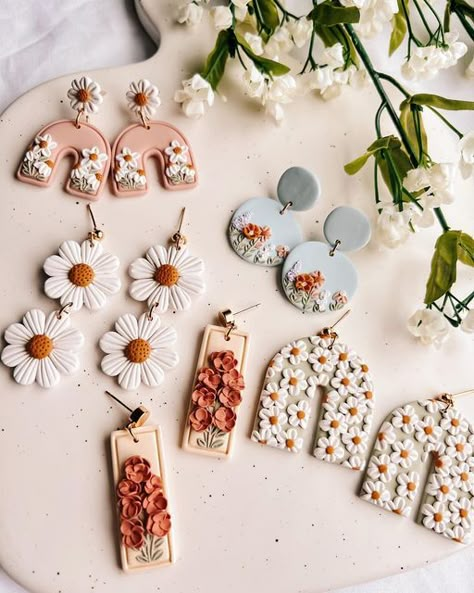 Noelle Earrings on Instagram: "my most favorite collection of all time ✨🌿🌼🌷🌞 launching this Friday at 6 PM EST! Which style is your fave so far? I shared almost every style I’ve made so far to my stories, so head there to see the full collection! #polymerclay #polymerclayearrings #polymerclayartist #polymerclaycreations #clayearrings #polymerclayjewelry #smallbiz #smallbizowner #smallbusinessowner #shopify #shopifyseller #smallbusiness #shopsmall #smallbusinesssupport #youngbusinessowner #bo Cute Earrings Polymer Clay, Popular Polymer Clay Earrings, Polymer Clay Small Business, Sculpy Earrings Diy, Earrings Made Of Clay, Spring Polymer Clay Earring Ideas, Clay Earrings Spring, Earring Polymer Clay, Clay Earring Inspiration