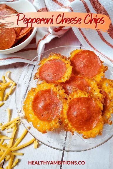 This post may contain affiliate links, which helps keep this content free. Please read our disclaimer for more info. These tasty keto pepperoni cheese chips will have everyone asking for more! It is quick, easy, only 2 ingredients, and virtually no clean-up! These Pepperoni Cheese Crisps have got to be the easiest (and quickest) Gluten Free, Low Carb, Keto snack of all time! All you need is two ingredients and less than five minutes! Bonus: You can cook them in a skillet, oven, or micr… Keto Pepperoni, Cheddar Chips, Pepperoni Chips, Easy Keto Snacks, Sugar Free Nutella, Keto Mac And Cheese, Cheese Chips, Cheese Crisps, Keto Cheese